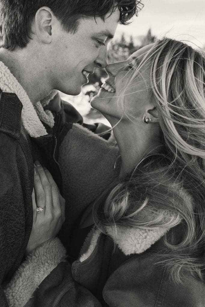 engagement photos taken in breckinridge colorado with a snowy mountain background