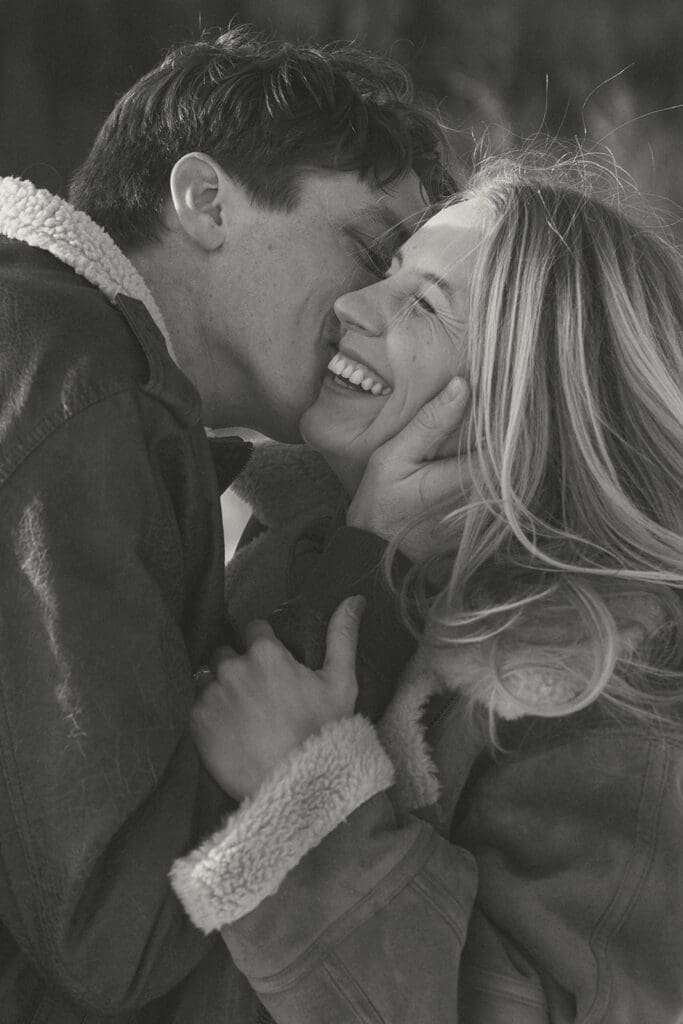 engagement photos taken in breckinridge colorado with a snowy mountain background