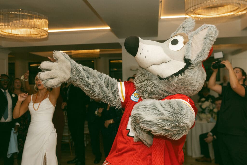 kc wolf dancing at reception in melrose abbey in kansas city