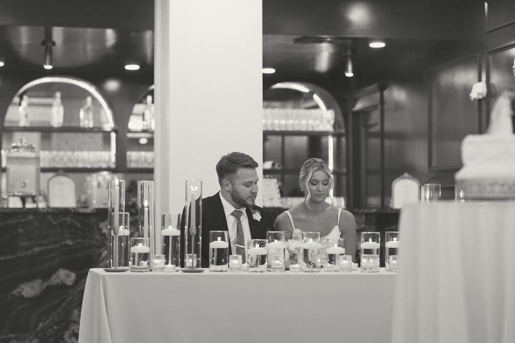 bride and groom prayer at reception in melrose abbey in kansas city