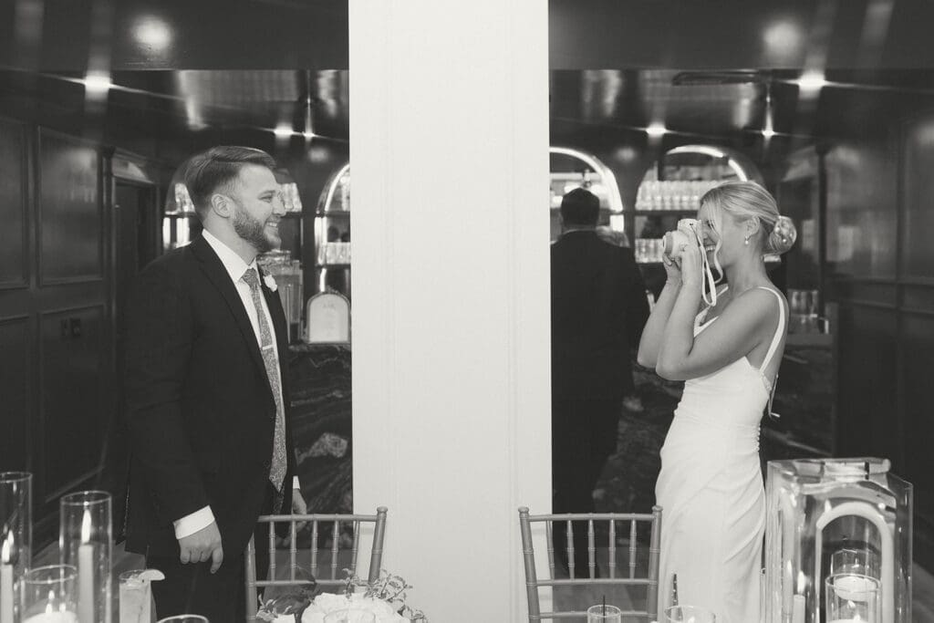 bride and groom candid moment in melrose abbey in kansas city