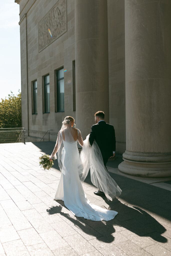 bride and groom candid moment at nelson atkins in kansas city