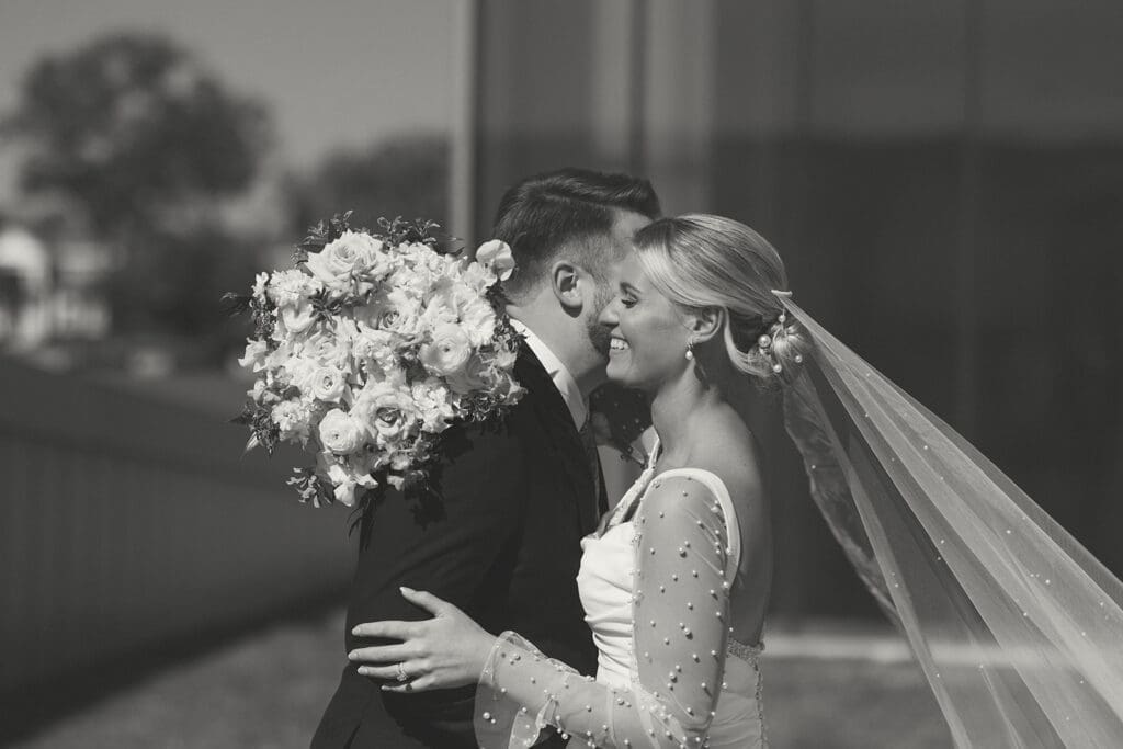 bride and groom candid moment at nelson atkins in kansas city