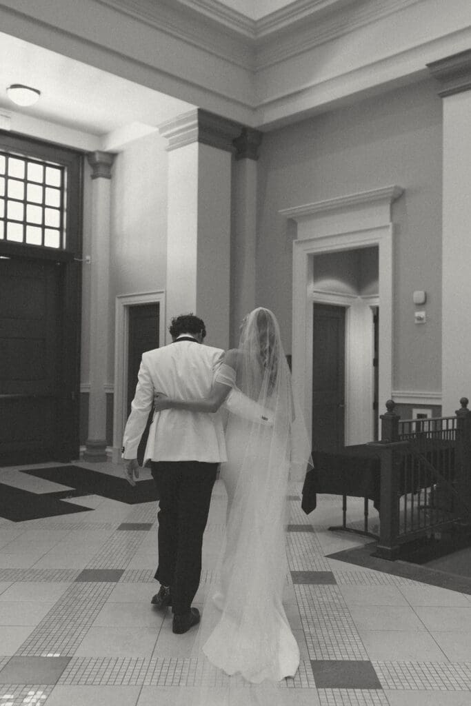 bride and groom in elegant catholic ceremony in kansas city
