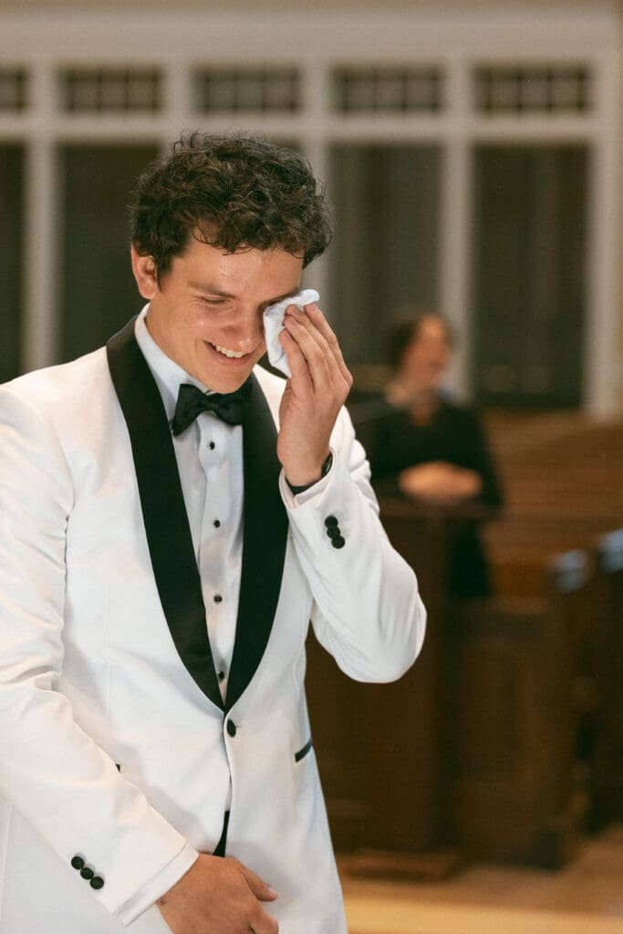 Groom tearing up as bride walks down aisle