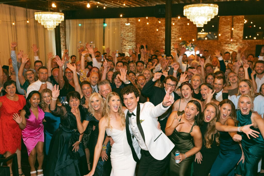 guests dancing at elegant, luxurious, colorful reception in kansas city