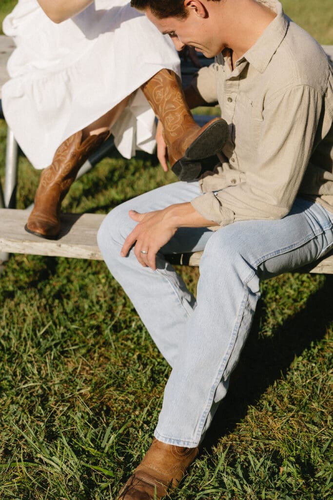 close up shot of cowboy boots during engagement session in kansas city